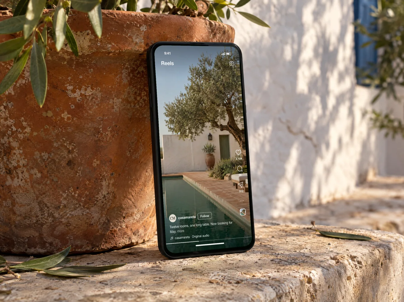 The finished Casa Mareta Reel playing on an iPhone leaning against a terracotta pot