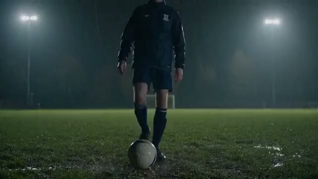 Floodlit pitch in the rain